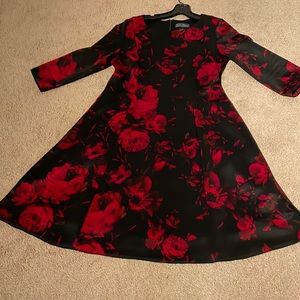 Black & red floral: she’ll is polyester & spandex, with thin polyester lining.